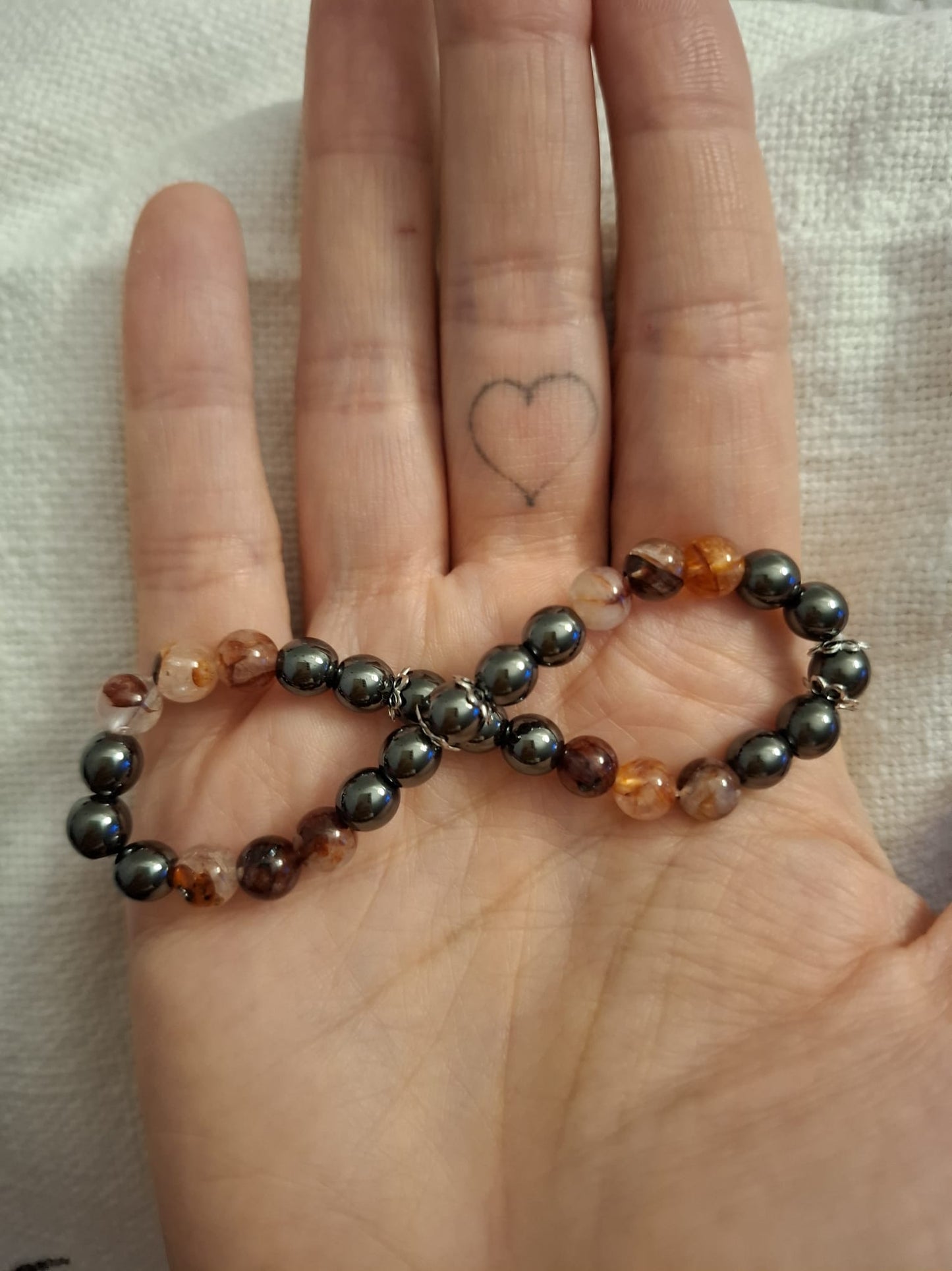 Heilstein-Chetteli Balance & Lebensfreude mit silbernen Elementen